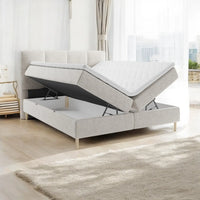 Lit BOXSPRING LEO - Avec tête de lit, coffre intégré, matelas ressorts ensachés et surmatelas inclus